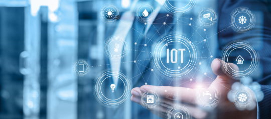 Businessman showing iot structure on blurred background.